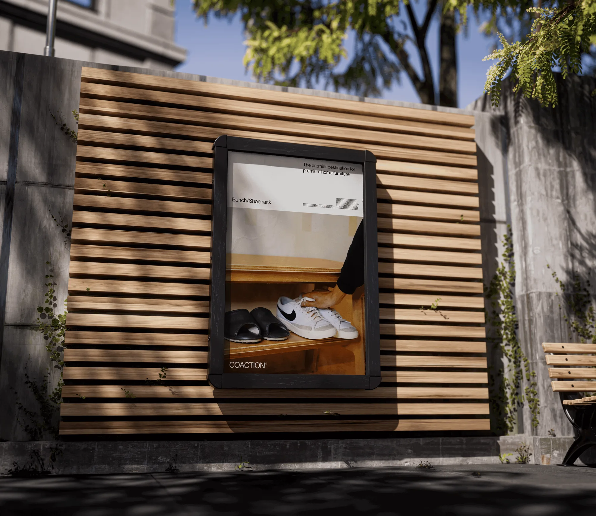 A framed Coaction poster of the bench with sneakers on its shelf, "The premier destination for premium home furniture", on a sunlit slatted wall