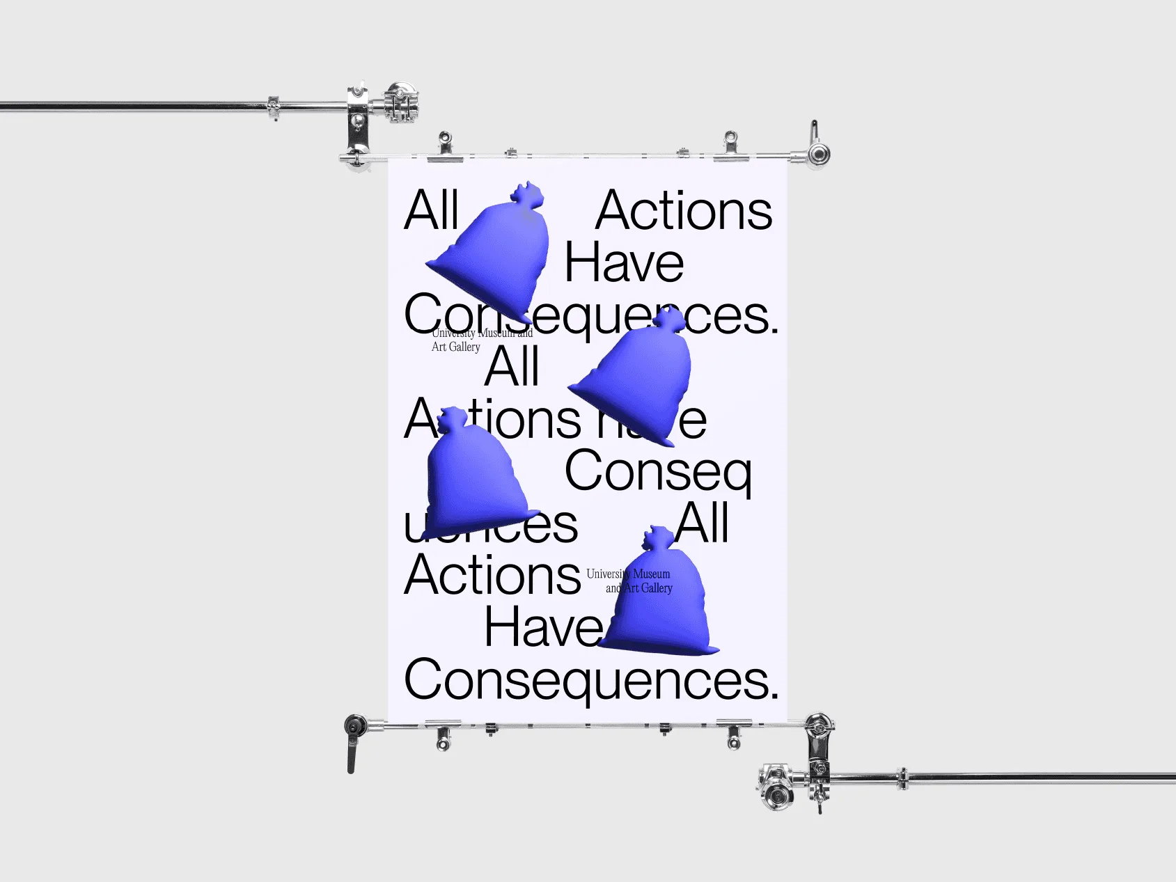 A lilac All Actions Have Consequences. poster with blue 3D rubbish bags, hung on chrome clamps against grey