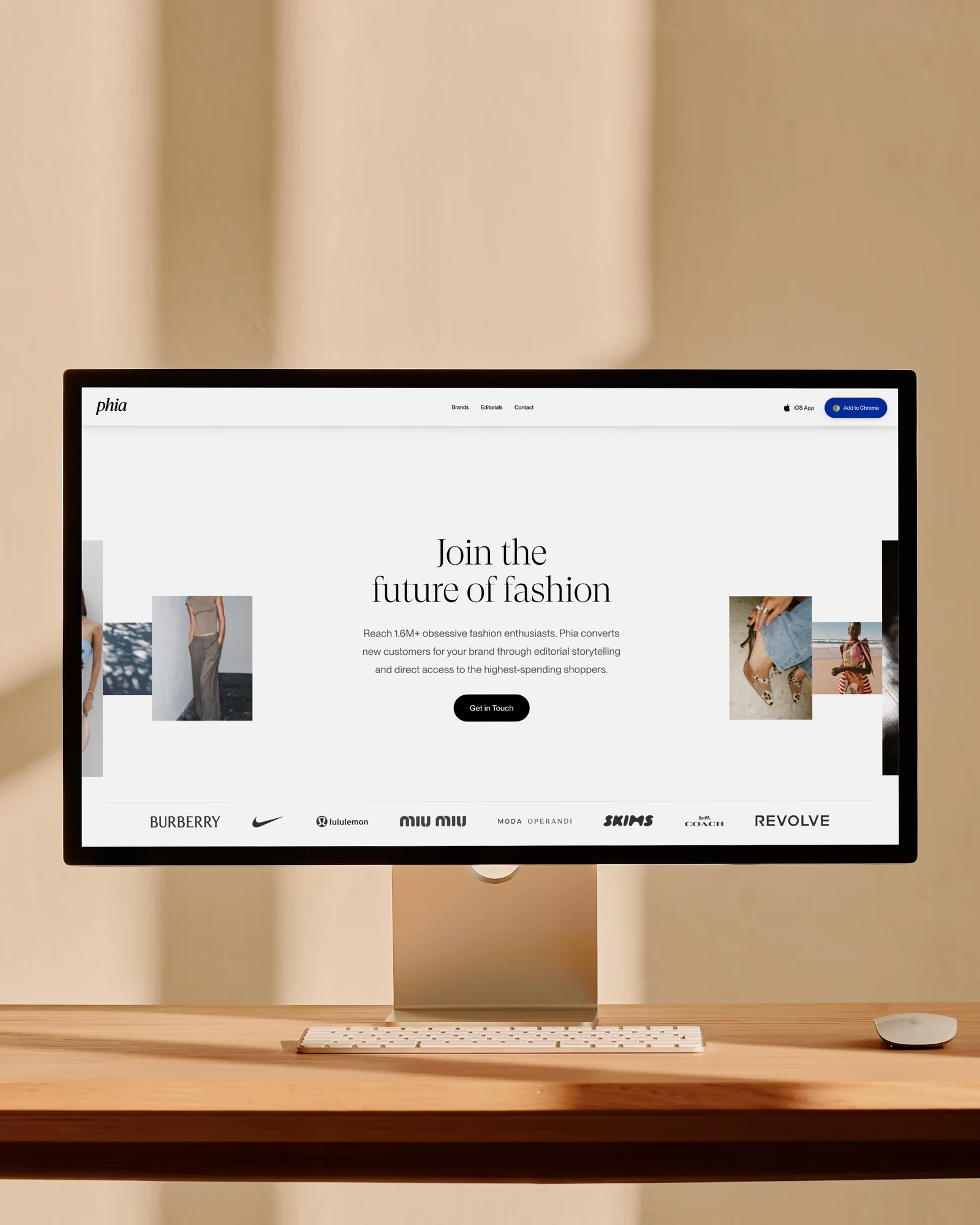 The partner page at desktop width on a studio display on a warm wooden desk: Join the future of fashion, the photo collage and the brands