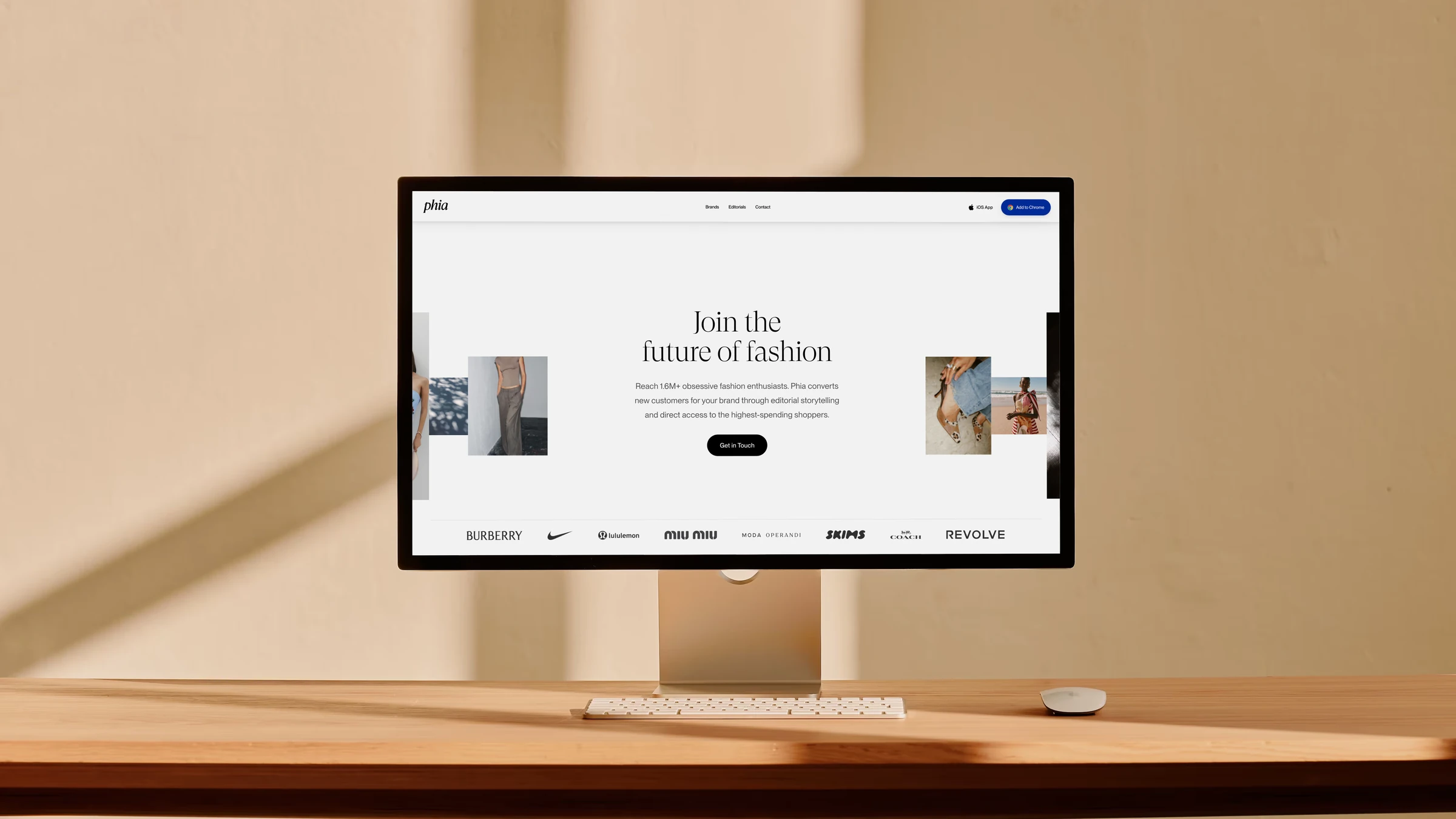 The partner page at desktop width on a studio display on a warm wooden desk: Join the future of fashion, the photo collage and the brands