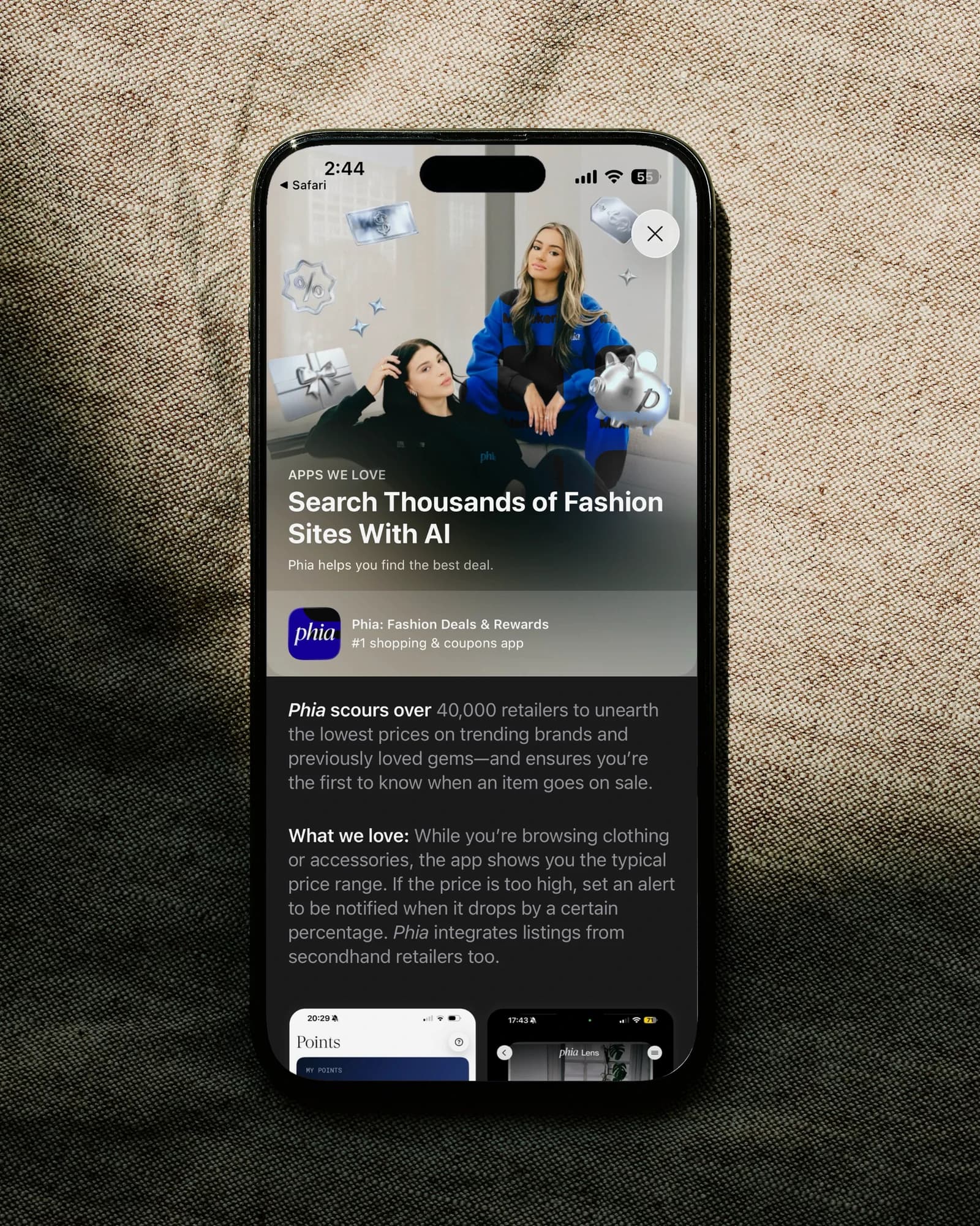 Phia in the App Store's Apps We Love, on a phone lying on linen: Search Thousands of Fashion Sites With AI, and why the editors love it