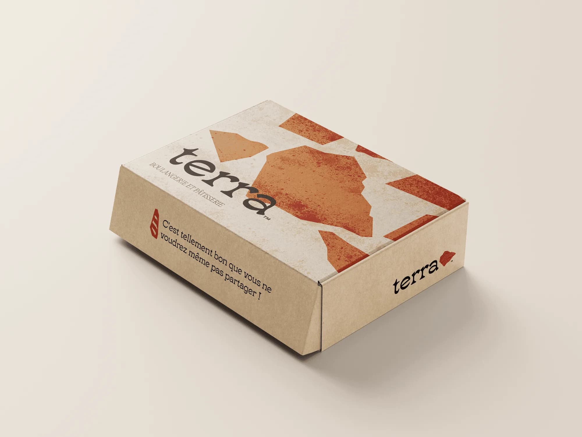 A kraft Terra mailer box printed with terracotta shards