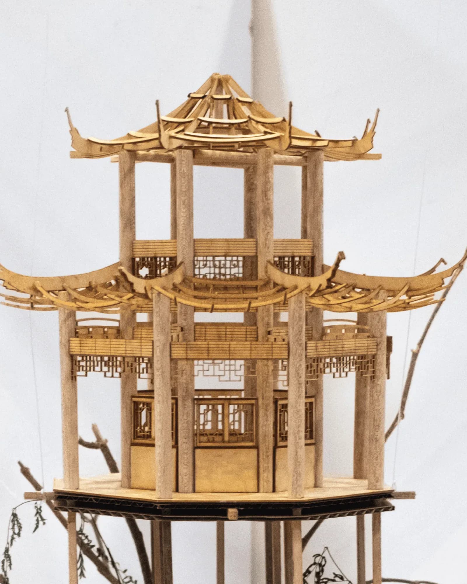 對影 Paired Shadows in detail: the pavilion's upturned balsa roofs and lattice